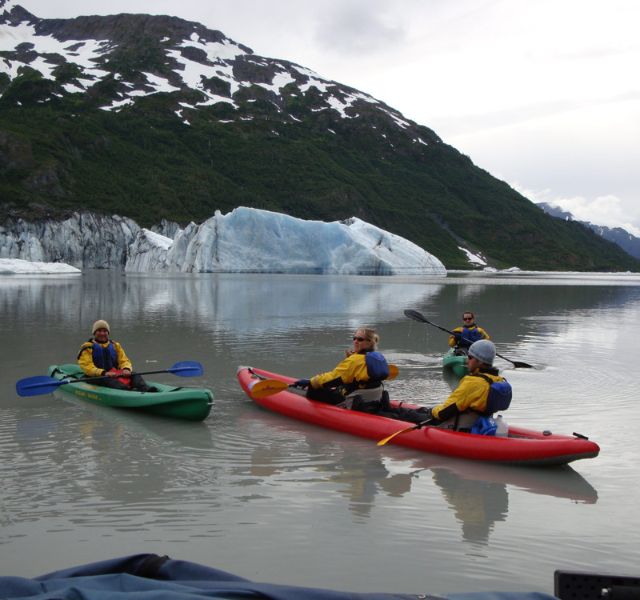 Small group on their way to start kayaking in Alaska